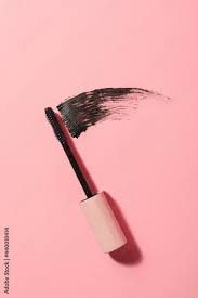 mascara wand and smear on pink