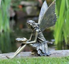 garden ornament sitting fairy sculpture