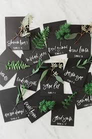 Secure with a dot of glue. Simple Fall Place Cards With Fresh Greenery Diy Lauren Saylor Stationery Interiors Design