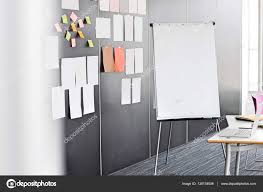 Flip Chart By Sticky Notepapers On Wall Stock Photo
