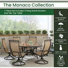 Hanover Monaco 7 Piece Outdoor Dining Set With 6 Sling Swivel Rockers And A 60 In Tile Top Table