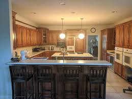 After removing the hardware, we recommend that the cabinets be thoroughly cleaned with a good cleaner degreaser to remove all grease and oils that normally buildup on kitchen cabinetry over time. How To Update A Kitchen With Wood Cabinets Without Painting Them Designed