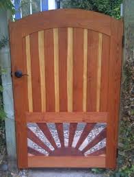 Arched Redwood Gate With Sunburst