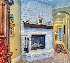 Austin Stone Fireplace And Stained Wood