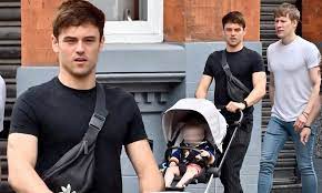 The olympian shares robbie with husband dustin lance black. Tom Daley 25 And His Husband Dustin Lance Black 44 Enjoy Walk With Son Daily Mail Online