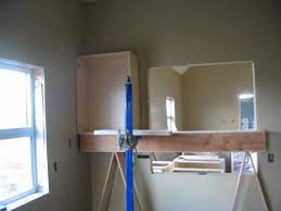 installing cabinets uppers or lowers