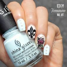 edgy feminine nail art fleur de lis