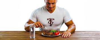 how much to eat for muscle growth t