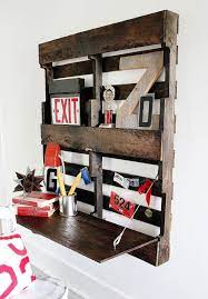 But let's skip the chalkboard and focus on the folding table. Wall Mounted Pallet Desk Thistlewood Farms Diy Pallet Projects Pallet Desk Pallet Diy