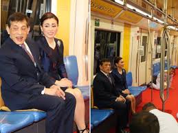 thai king boards public train with wife