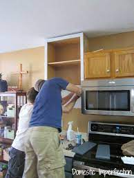 Should kitchen cabinets go to 9 foot ceiling? How To Raise Your Kitchen Cabinets To The Ceiling Domestic Imperfection
