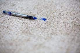 remove an ink stain from a rug or carpet