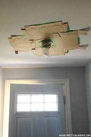 spray painting a light fixture without