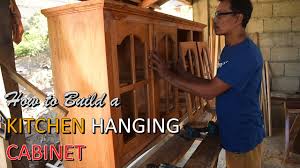 Start with the corner cabinet and measure up from label the location of the kitchen wall cabinets and appliances on the wall. How To Build A Hanging Cabinet Wall Installation Kitchen Cabinet Amazing Carpenter Skills Youtube