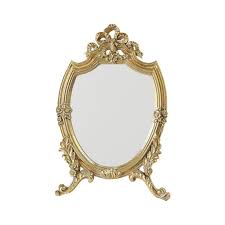 embossed golden makeup mirror with