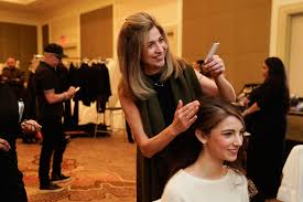 backse of the runway show remona soleimani styled the model s hair