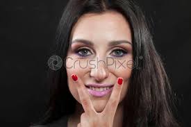 Find the perfect woman with black hair and green eyes stock illustrations from getty images. Woman With Black Hair And Green Eyes Shows Letter V Stock Photo Crushpixel