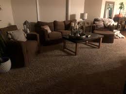 dark brown carpet and sofa
