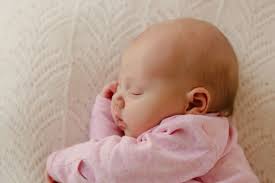 can newborns sleep on their side 5
