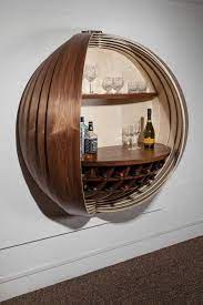 bar cabinet inspired by a spinning coin