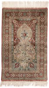 an extremely fine silk hereke rug 20th