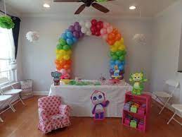 first birthday word party colorful arch
