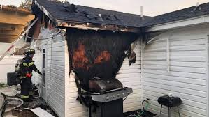 house fire started by gas grill