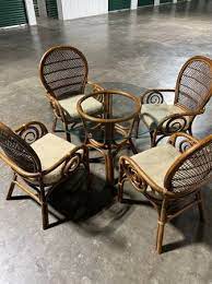 Wicker Chairs With A Glass Table Top