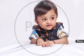 image of cute indian baby child playing