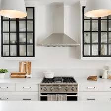 Glass Upper Cabinets Either Side Of