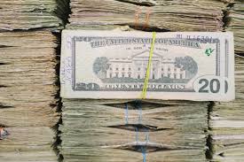 Pad your bank deposits with a few fakes and go in on a really busy time. The Counterfeit Bill The New York Times