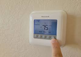 how to reset a honeywell thermostat