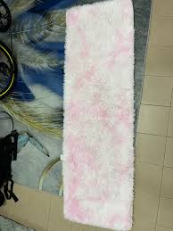 fluffy pink and white rug furniture