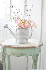 spring watering can fl centerpiece