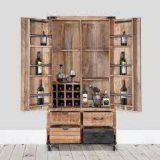 Made of metal and wood. Farmhouse Industrial Style Rustic Solid Wood Rolling Wine Bar Cabinet