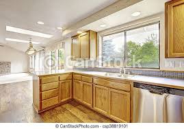 All kitchen cabinets at menards®. Kitchen With Golden Wood Cabinets And Hardwood Floor Simple American Home Northwest Usa Canstock