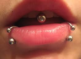 lip piercing options painful
