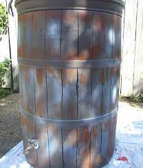 paint a plastic rain barrel to look