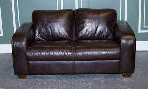 chocolate brown leather two seater sofa