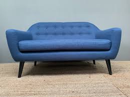 lovely blue two seater sofa possibly