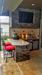 granite and stonework outdoor kitchen