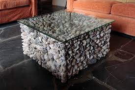 Round marble coffee table with gold legs. Driftwood Tables Mirrors Furniture Tristan Cockerill