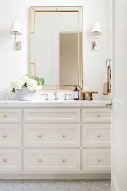 This mirror doesn't necessarily go with this vanity from a style standpoint anyway, but it's great for illustration purposes. Guide To Hanging Bathroom Vanity Lighting And Mirrors Liven Design