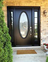 A Black Door With A Large Oval Window