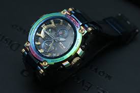 Water resistant to 30 meters, it has an electroluminescent panel. G Shock Mtg B1000rb 20th Anniversary Model With Rainbow