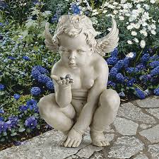 curious cherub angel statue garden
