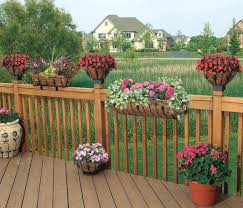 A large deck will look better when there are many pots on it. Balcony Railing Garden Ideas Novocom Top