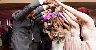 A packed dance floor is the sign of a truly amazing wedding reception. 10 Upbeat Bridal Party Entrance Songs To Get The Party Started Weddings Wedding Ideas By Kelly
