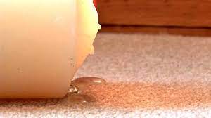 remove candle wax from carpets