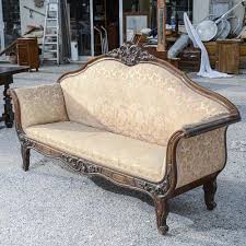 italian sofa in carved walnut with